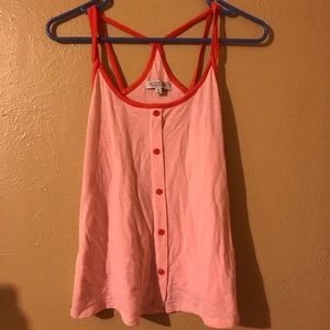 sleeveless pink shirt